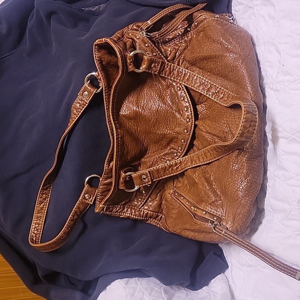 Marc Ecko woman's purse. Beautiful leather, snake like skin texture, storage